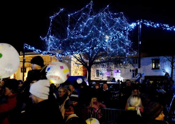 Brackley Christmas Lights switch-on and Lantern Parade. Lights in The Market Square. NNL-171125-225005009