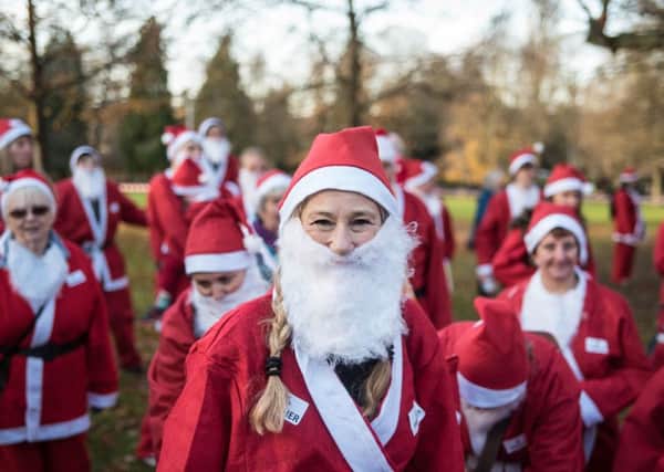 More than 250 people took part in the Santa Dash in People's Park, Banbury. Pictures by Neil Simmons, Modern Parlance Photography NNL-171128-124012001