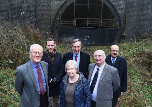 From the left, Ian Bramble (Roger Coy Partnership), Cllr Liz Griffin (Daventry District Council), Cllr Colin Poole (Daventry District Council). Back, from the left, Luke Abbott (Roger Coy Partnership), Cllr Chris Millar (Daventry District Council), Gary Underhill (Daventry District Council) outside the Victorian railway tunnel at Catesby. NNL-170712-141450001