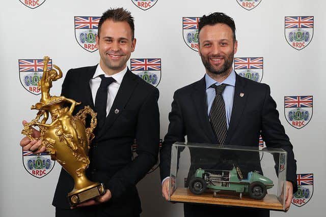 Aston Martin Racing Team drivers Darren Turner and Jonny Adam are pictured with their awards. Photo: Jacob Ebrey