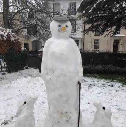 Grandpa snowman and his dogs on West Bar Street by Camilla Finlay NNL-171112-101014001