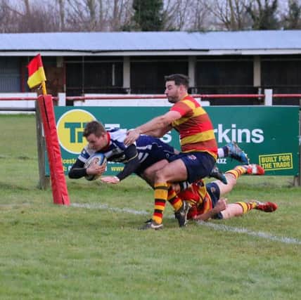Tomm Gray forces his way over to score his first try at Bicester for Banbury Bulls. Photo: Simon Grieve