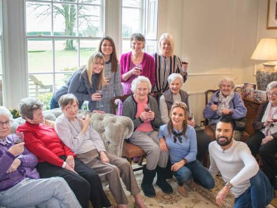 Residents of Featherton House enjoying a sherry with Geri Halliwell and Rylan Clark-Neal. Photo: Recognition PR