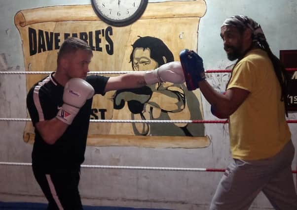 Welterweight title contender Frankie Gavin works the pads at Dave earle's Spit N Sawdust gym NNL-181201-115322001