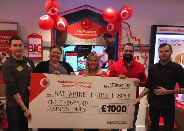Vodafone staff at the Banbury branch present the cheque to Katharine House Hospice. (L-R) Vodafone Banbury assistant store manager Alex Farrell, Jessica Hill from Katharine House Hospice, store manager Shonna Ashmall and sales advisers Alex Ninescu and James Faulkner. Photo: Vodafone NNL-180126-111635001
