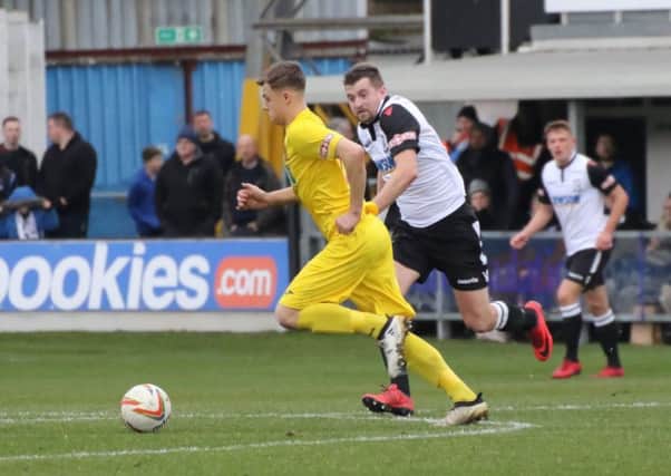 Banbury United's Charlie Hawtin goes on a run at Hereford. Photo: Andy Walkden