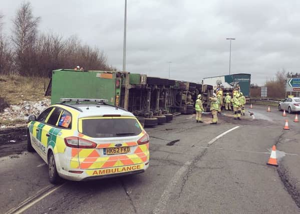 A lorry overturned on the roundabout at junction ten of the M40. Photo: Thames Valley Police NNL-180129-111901001