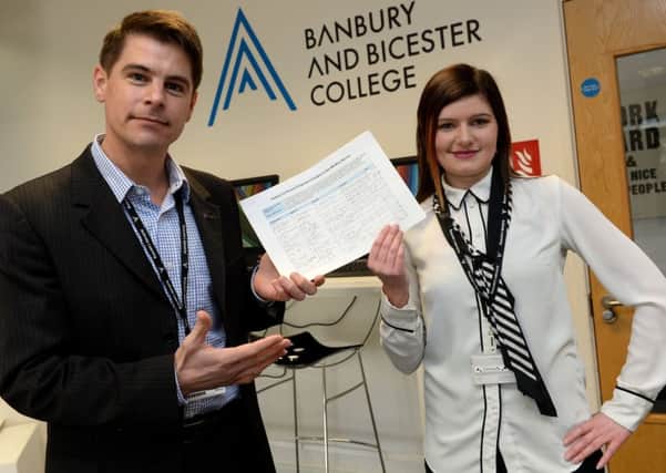 Banbury area 499 bus service petition. Christina Elmes and Bernard Grenville-Jones, Head of Campus with the petition, at Banbury and Bicester College, Banbury. NNL-180130-144755009