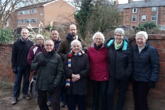 Cork Lane residents gather to protest plans for homes on the tiny street NNL-180502-160733001