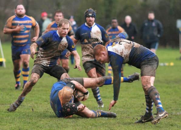 Brackley scrum half Luke Kimber and hooker Mike Clark compete for the ball at Bedford Swifts. Photo: Neale Hutchinson NNL-180602-102156002