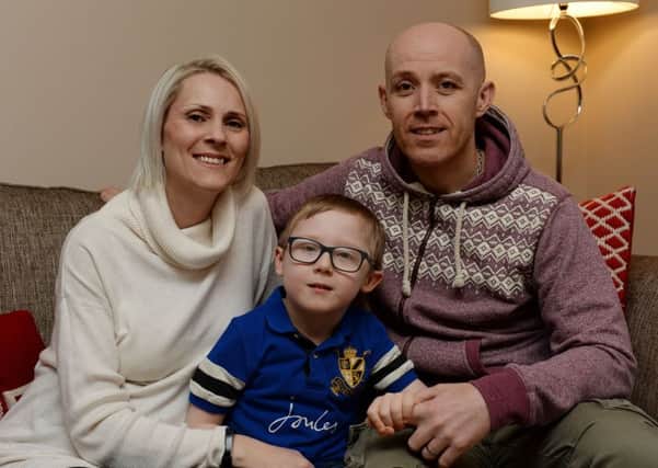 Billy Humpheys from Adderbury near Banbury, needs Â£85,000 for surgery to help him walk. He is pictured with his mum and dad, Karen and Peter. NNL-180602-181932009