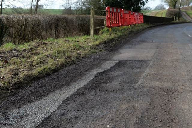 Potholes at North Newington near Banbury. NNL-180602-133740009