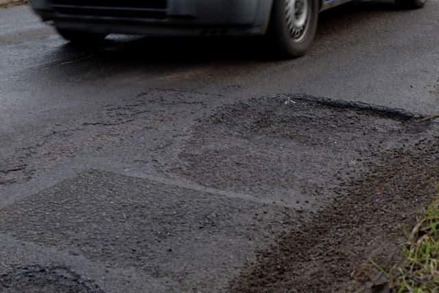 Potholes at North Newington near Banbury. NNL-180602-133803009