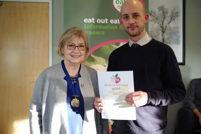 A gold Eat Out Eat Well award was also given to Alex Farmer from Prodrive by Cllr Lis NNL-180214-100522001