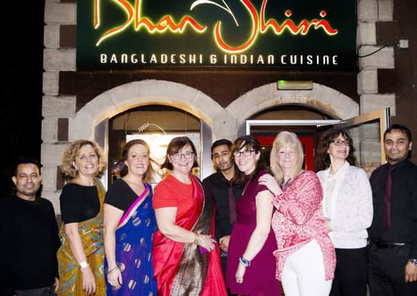 Curry fundraising night at the Dhan Shiri indian restaurant in Brackley. Brackley ladies raising awareness and money for breast cancer ahead of the Moonwalk challenge in May 2018.L-R Mohammed Chaudary, Jacqui Parsons, Holly Jones, Trish Griffiths, Sadiqul Chaudary, Lucie Joels, Debbie Grainge, Jayne Peltz and Abul Hasnath NNL-180220-093550009
