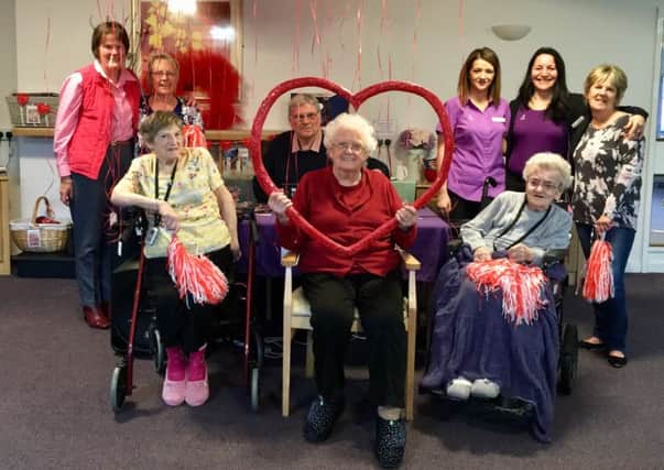 The Ridings Care Home residents with their families, team leader Kirsty Brady and activity coordinator Sandra Ramos and Bob Dainty from Banbury FM. Photo courtesy of the care home NNL-180216-112459001