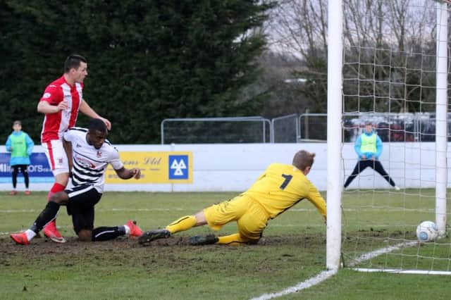 Aaron Williams scores Brackley Town's second goal against Darlington