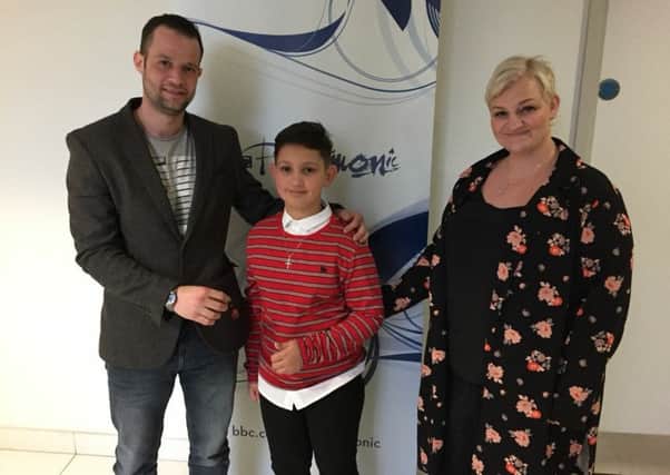 Ben Hornsby (left) meets Emmanuel Iqbal and his mother Samantha Wasilewski at The Jeremy Kyle Show studios NNL-180221-103540001