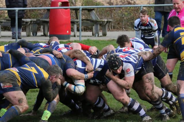 Banbury Bulls get to grips with Old Centralians. Photo: Simon Grieve