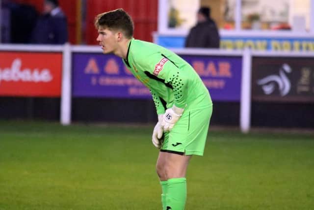 Banbury United keeper Jack Harding coulod be bac to face St Ives Town