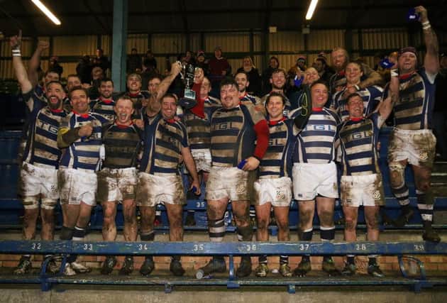 Banbury Bulls celebrate their success in the Oxon Knockout Cup final. Photo: Simon Grieve