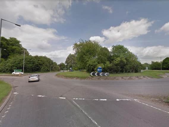 The car collided with the roundabout at the junction of the A43 and A422 (Picture: Google)