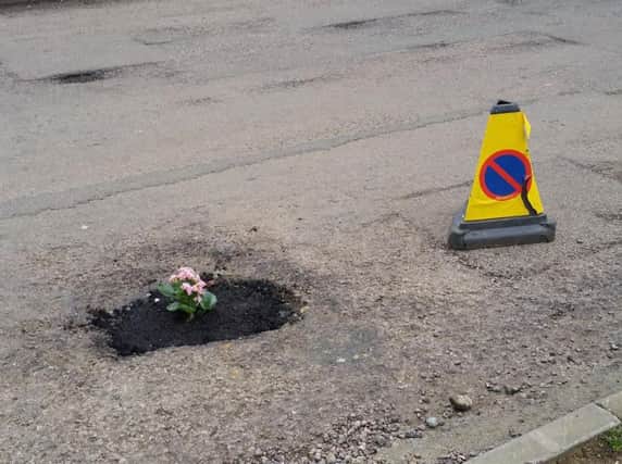 The DIY repair of the pothole in Farmfield Avenue, Banbury