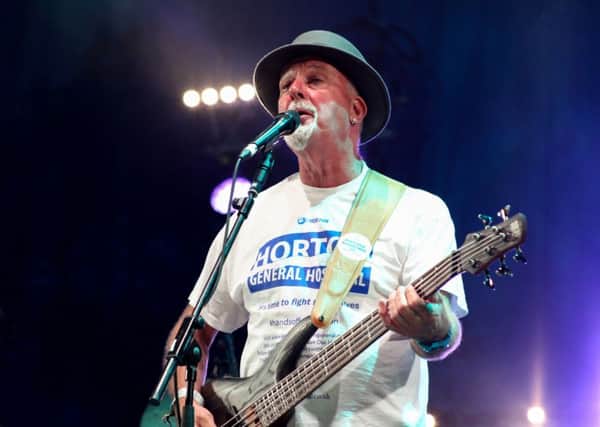 Dave Pegg in the Keep the Horton General campaign tee shirt at Fairport's Cropredy festival NNL-160815-144353001