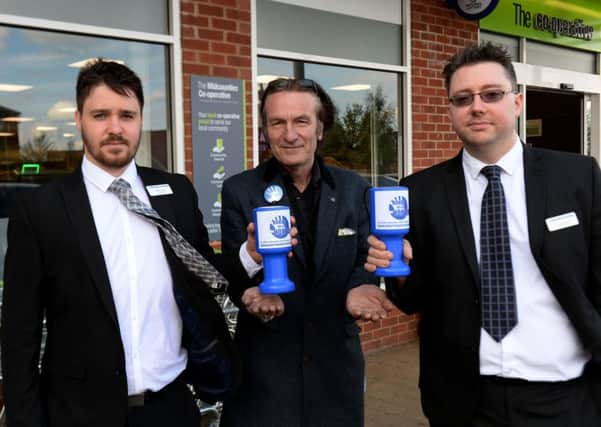 Banbury area Co-op stores are having Horton Hospital collecting tins. From the left, Mike Large, Ruscote Co-op manager, Keith Strangwood and Darren Bott, team manager, Hanwell Fields Co-op. NNL-180105-173652009