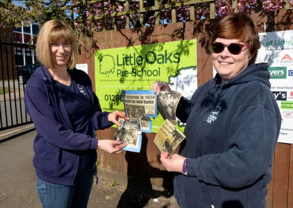 Little Oaks Pre-school 50th anniversary. Setting Manager, Nikki Lloyd, left and Pre-school Practitioner, Sue Corns, with some old press cuttings. NNL-180105-142310009