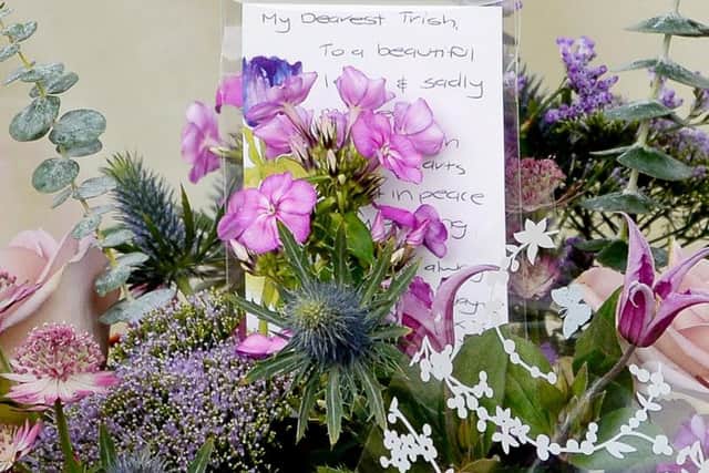 Tributes left to Patricia McIntosh at her home in Knightcote.