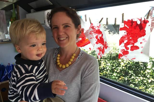Donna Winser and her son Henry on the Play Bus