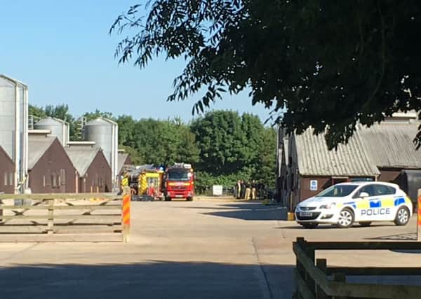Emergency services at a chicken farm by Enstone Airfield where a plane crashed into one of the buildings NNL-180627-091856001