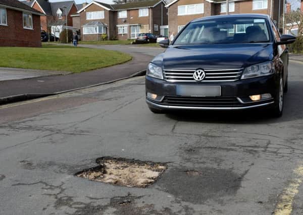 A deep pothole on Mewburn Road, Banbury NNL-180503-123017009