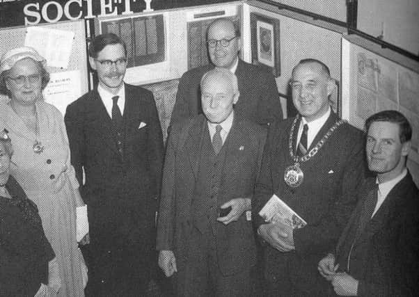 Members of the Banbury Historical Society at an exhibition in the Town Hall with Mayor and Mayoress, Councillor Malcolm Spokes and Mrs Spokes (1957-58). Founder member Jeremy Gibson extreme right and President Lord Saye and Sele centre