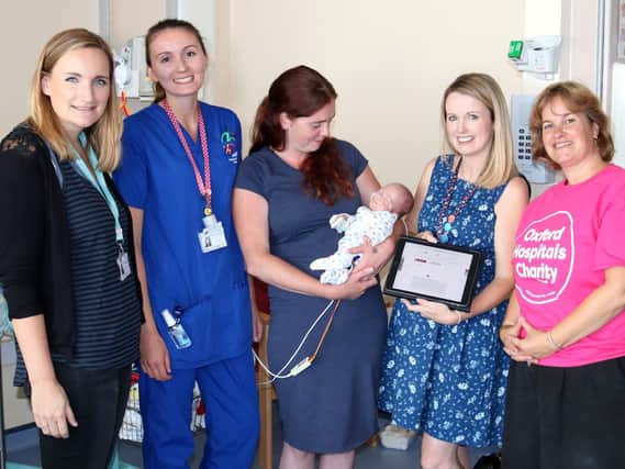 From left, SSNAP charity director Emma Cantrell, staff nurse Anna Ryan, Sara Deans with baby Frazer, senior clinical psychologist Dr Jacinta Cordwell and Sarah Vaccari from Oxford Hospitals Charity. Photo: OUH NHS Foundation Trust