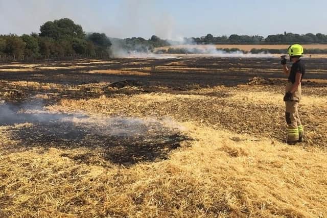 Firefighters tackling a fire on a farm in Ardley on August 6, at 1.40pm.