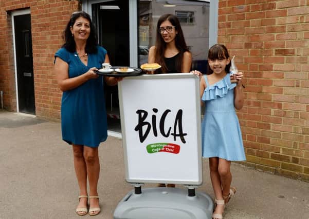 Isabel Rebelo with her daughters Beatrice and Catarina Gil outside Bica Portugese Cafe Deli