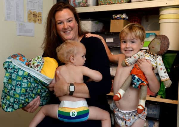 Zoe Wilson from Wigginton runs a reusable nappy bank. She is pictured with her children, Sebastian and Toby, right. NNL-180409-124550009
