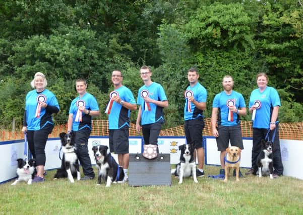 Banbury Cross Flyball's top team with their Division 4 winners shield from the UK Flyball Championships