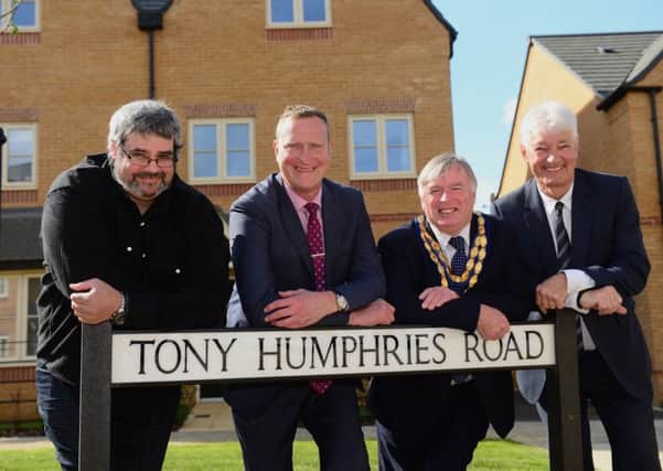 (L-R) Tony Humphries' son David, Cllr Mark Cherry, Cherwell District Council chairman Cllr Maurice Billington and Chris Shaw from Bloor Homes at the sign for Tony Humphries Road. Photo: Steve Baker/Bloor Homes NNL-180919-114425001