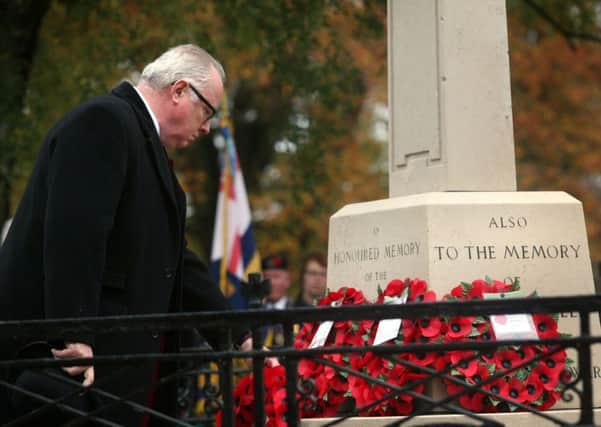 Cllr Kieron Mallon lays a wreath at the Cenotaph in People's Park Picture by Lucy Ford
