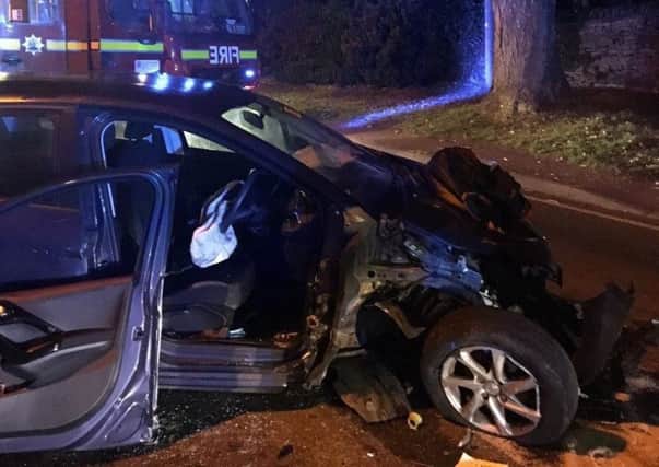The drivers' door was cut off by firefighters so they could get out after the crash with a HGV in Chipping Norton. Photo: Oxfordshire Fire and Rescue Service NNL-180510-142740001