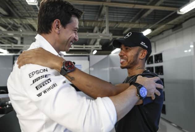 Toto Wolff and Lewis Hamilton celebrate Sunday's victory