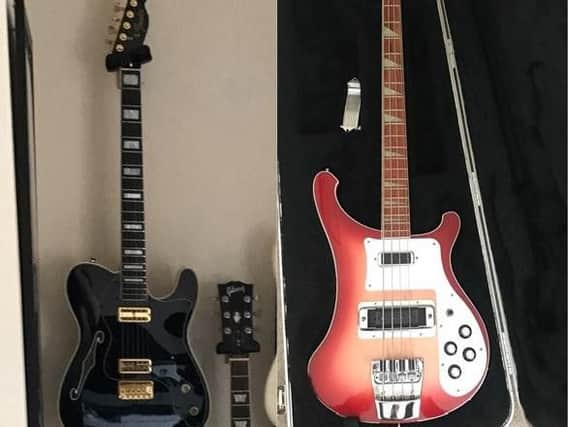 Two guitars were stolen from a property on Haydock Road, in Bicester. Left, a black customised Fender Telecast and, right, a red Rickenbacker 4003 Bass.