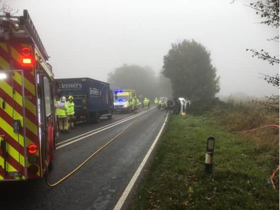 A car ended up on its side in a hedge after a crash on the A361. Photo: Oxfordshire Fire and Rescue Service