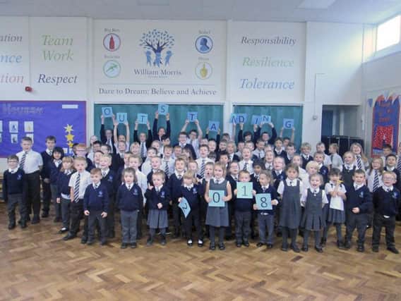William Morris Primary School pupils celebrate the 'outstanding' rating from Ofsted