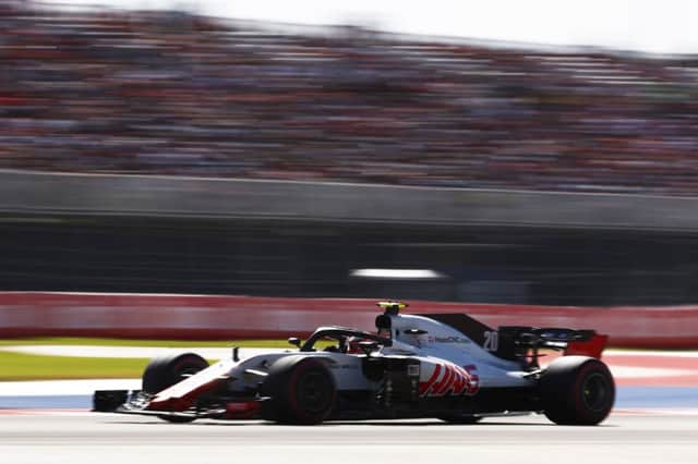 Kevin Magnussen on his way to ninth place in Sunday's US Grand Prix before being disqualified