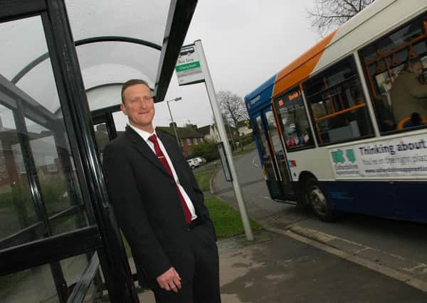 Councillor Mark Cherry at the newly-installed bus stop on Fairway, Banbury, which was the victim of vandalism and grafitti for five years. NNL-140112-161259001