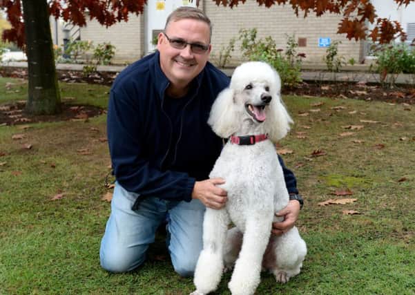 Chris Stamp from Banbury with his agility poodle, Scrappy. NNL-181016-125111009